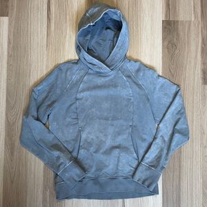 Gray lululemon athletica hoodie with front pocket and thumb holes
